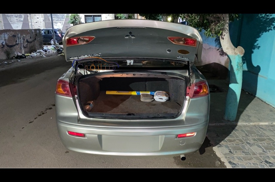 Lancer EX Shark Mitsubishi ذهبي
