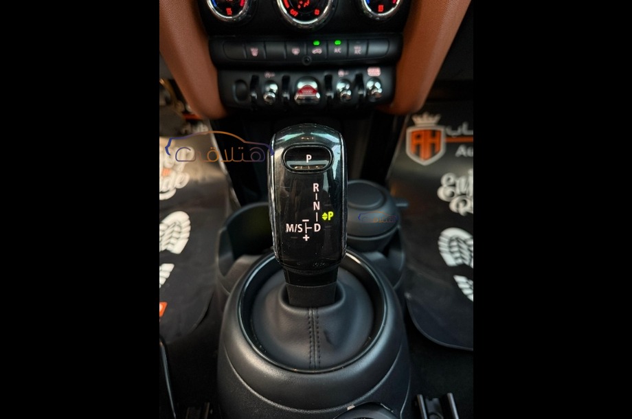 Cooper Mini اخضر غامق