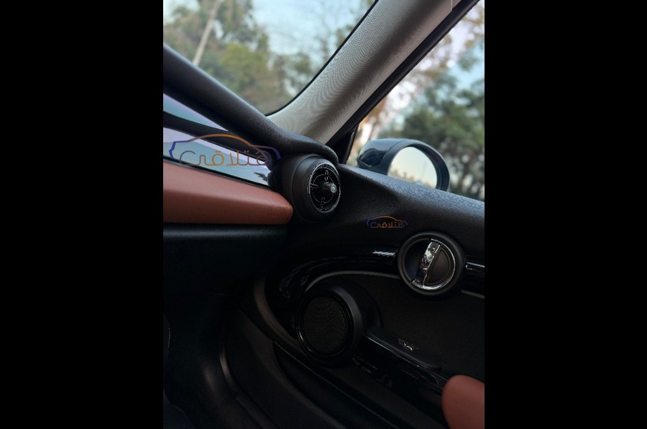 Cooper Mini اخضر غامق