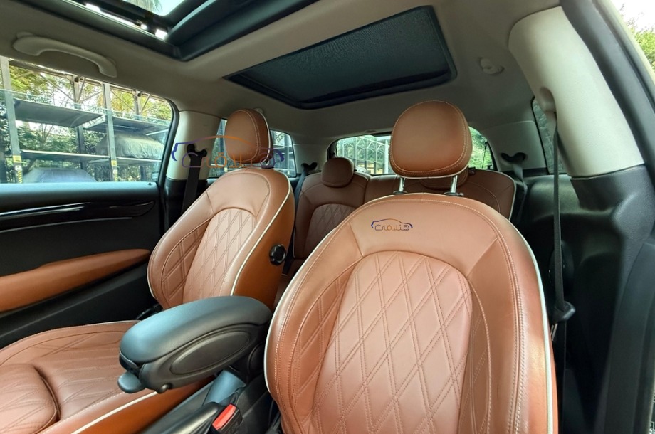 Cooper Mini اخضر غامق