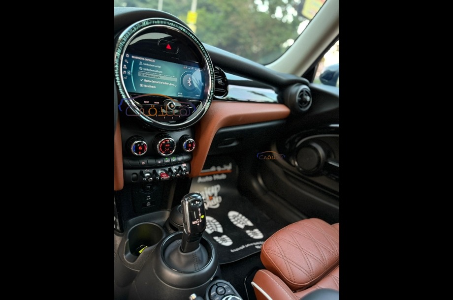 Cooper Mini اخضر غامق