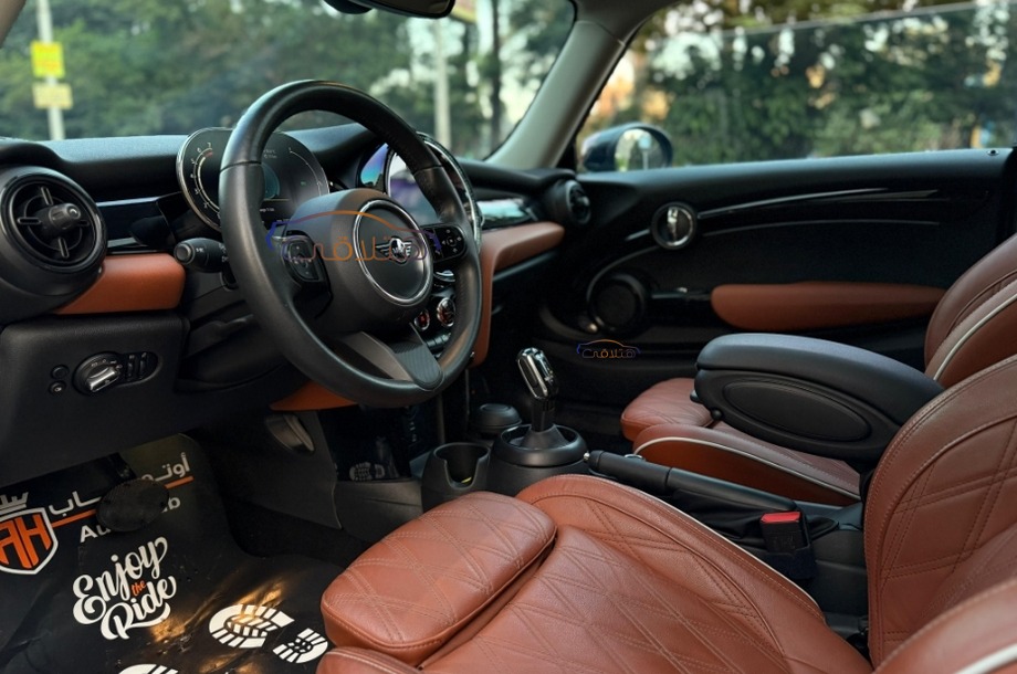 Cooper Mini اخضر غامق