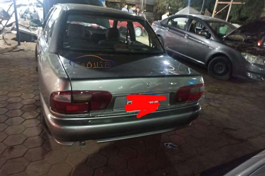 Wira Proton زيتوني