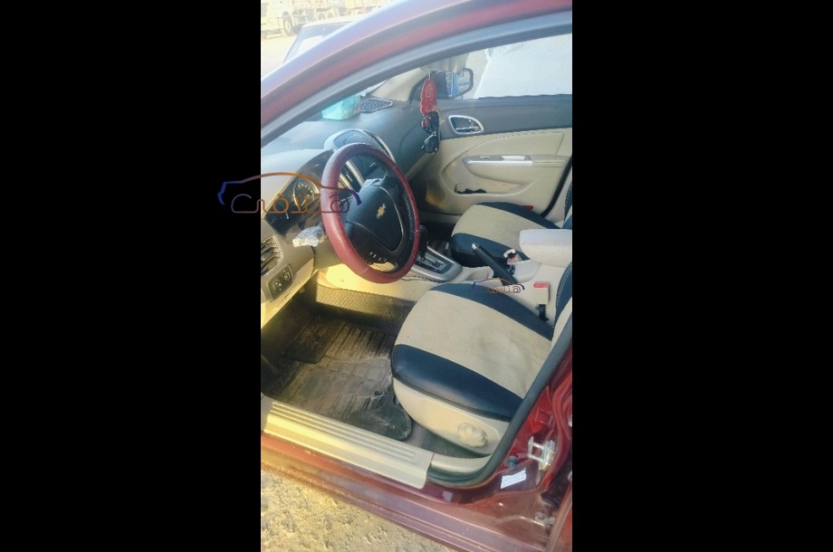 Optra Chevrolet Dark red