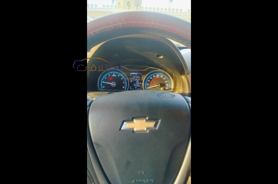 Optra Chevrolet Dark red