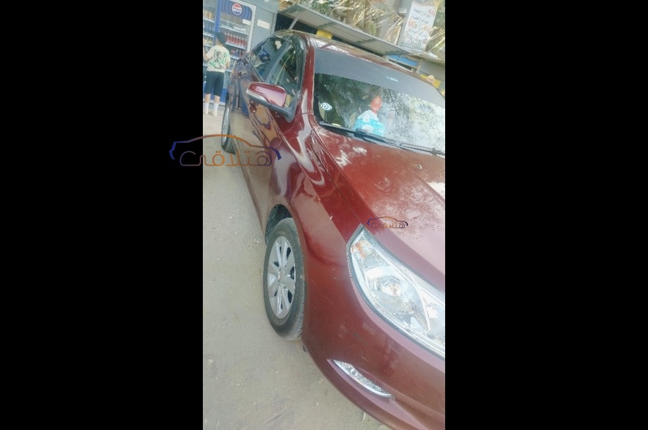 Optra Chevrolet Dark red