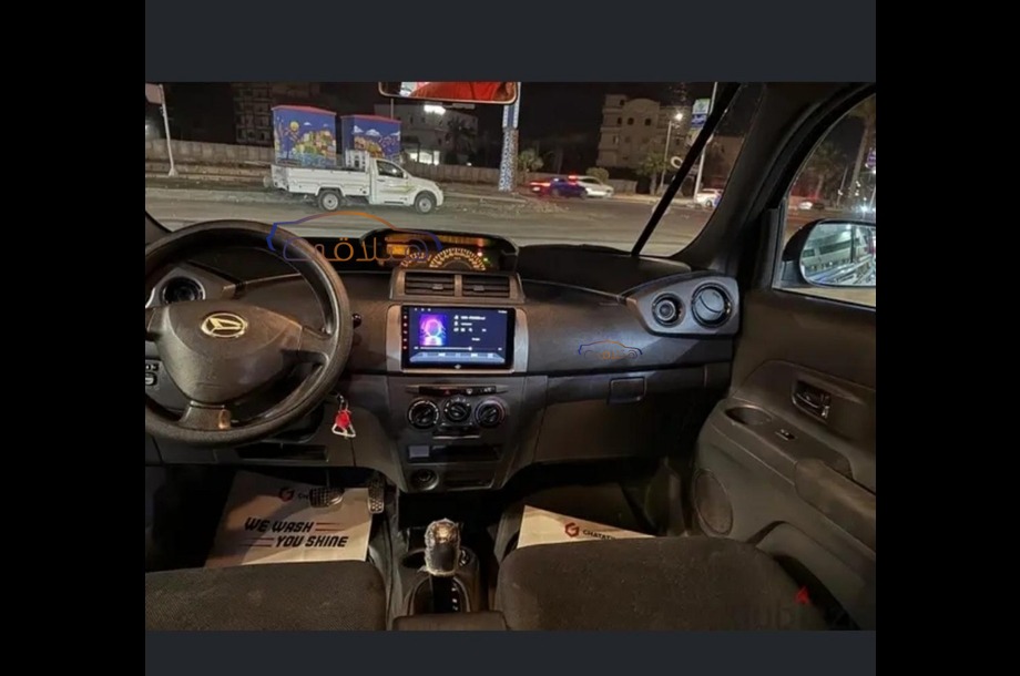 Materia Daihatsu احمر غامق