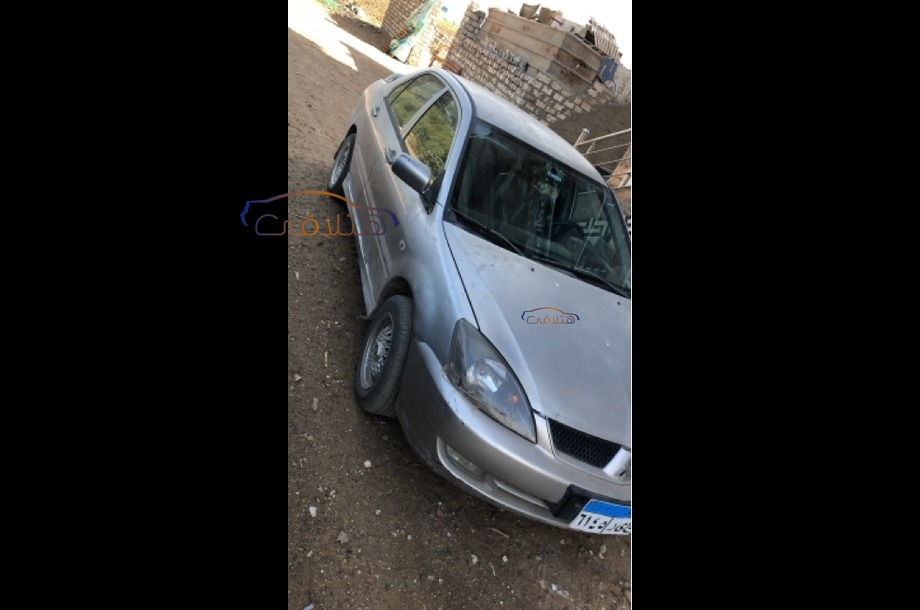 Lancer Puma Mitsubishi فضي