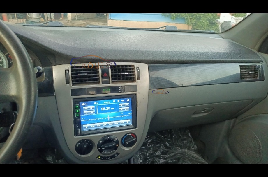 Optra Chevrolet فضي