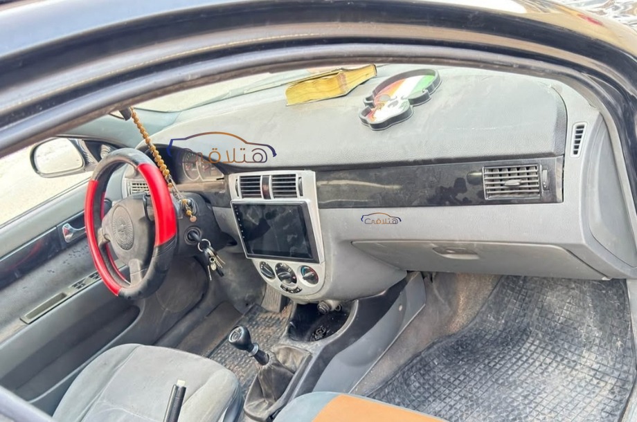 Optra Chevrolet أسود