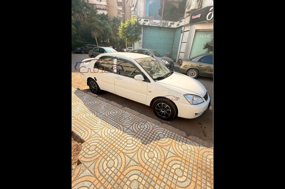 Lancer Puma Mitsubishi أبيض