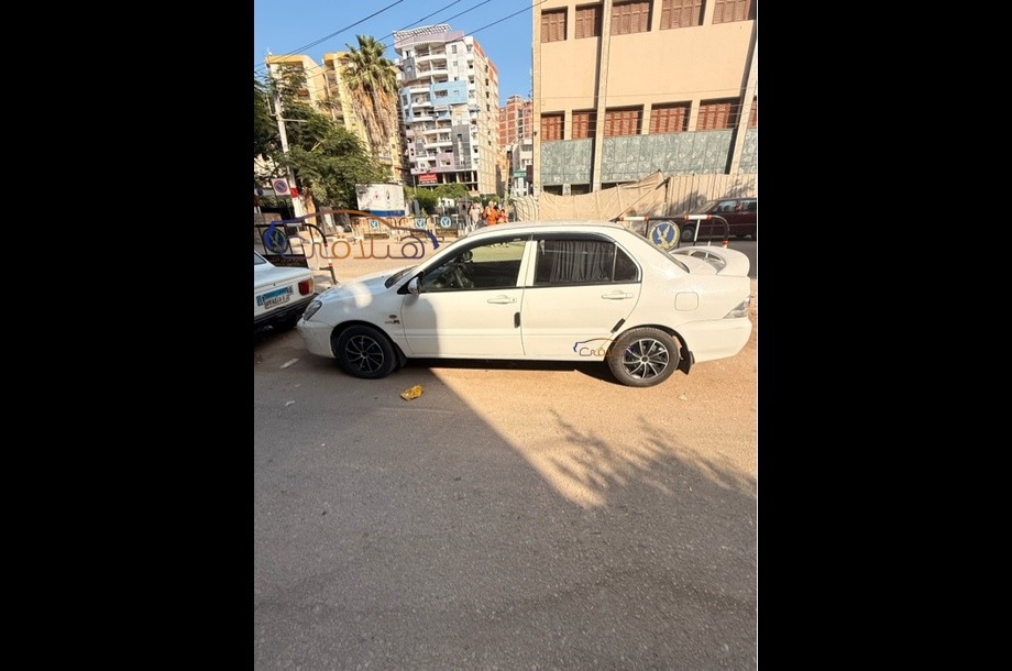 Lancer Puma Mitsubishi أبيض