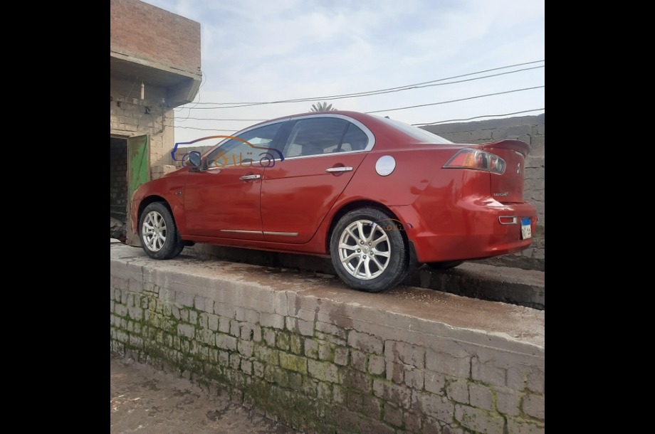 Lancer EX Shark Mitsubishi احمر