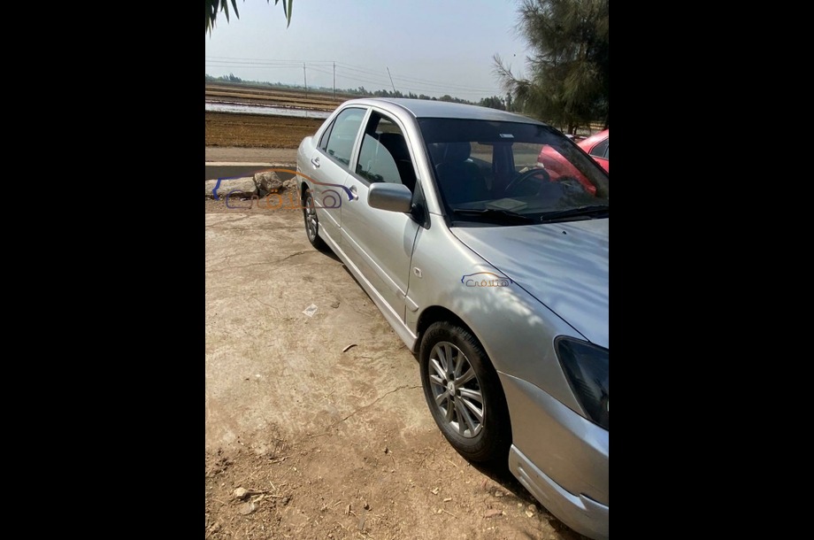 Lancer Puma Mitsubishi فضي