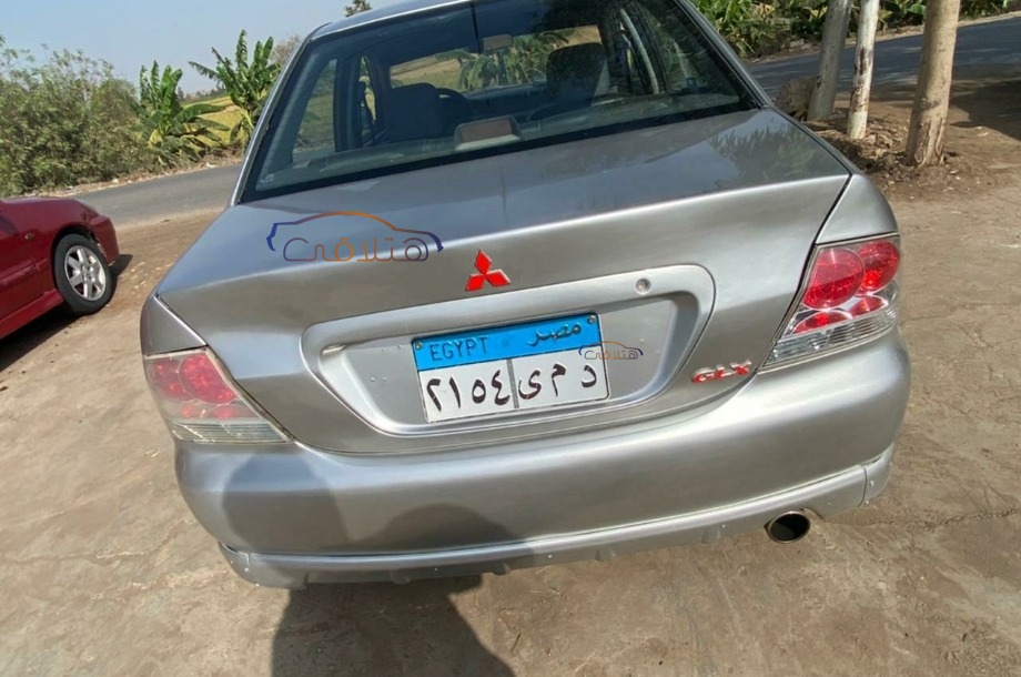 Lancer Puma Mitsubishi فضي