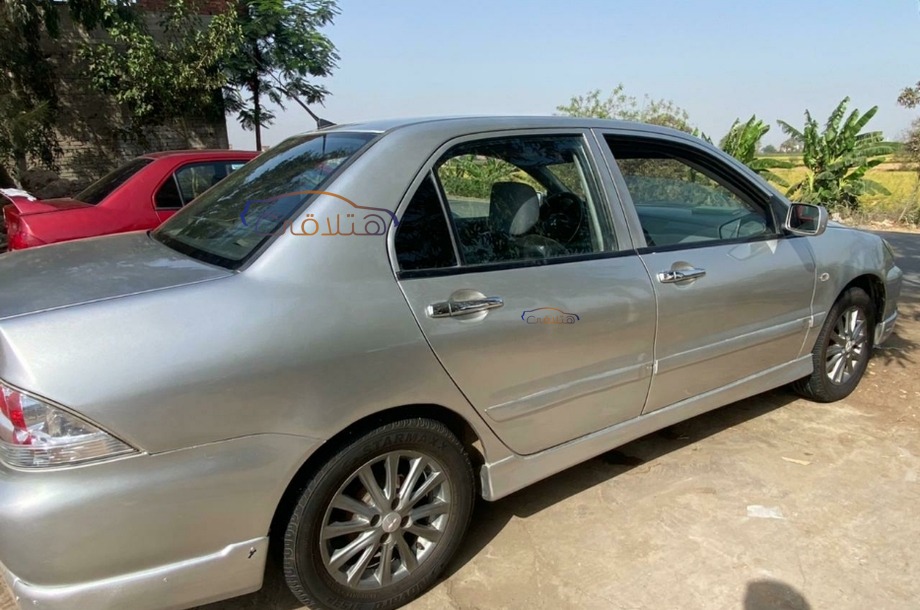 Lancer Puma Mitsubishi فضي