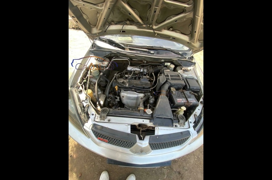 Lancer Puma Mitsubishi فضي