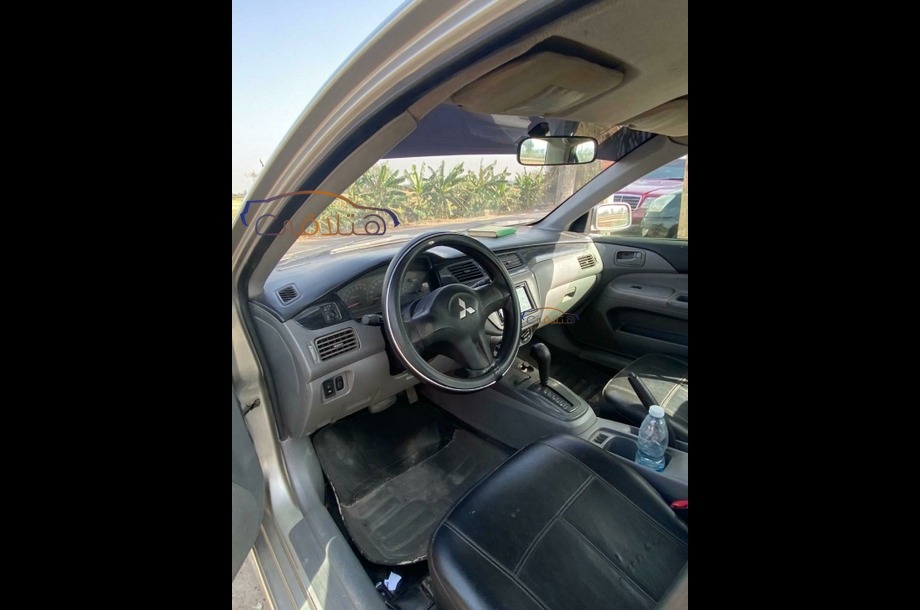 Lancer Puma Mitsubishi فضي