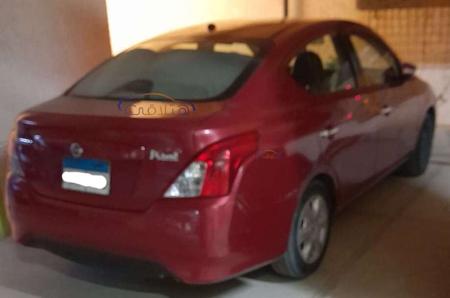 Sunny Nissan Dark red