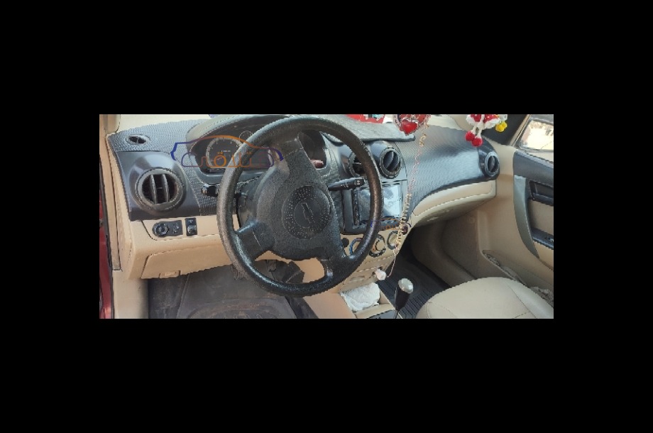 Aveo Chevrolet احمر غامق