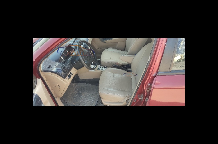 Aveo Chevrolet احمر غامق