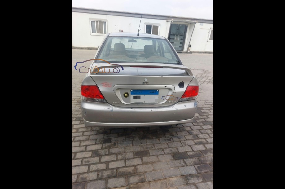 Lancer Puma Mitsubishi فضي