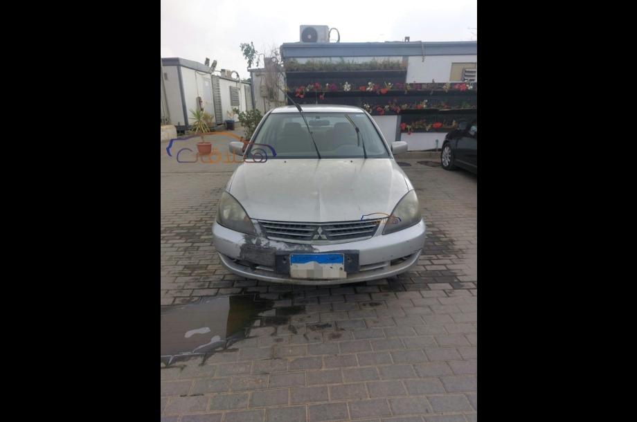 Lancer Puma Mitsubishi فضي