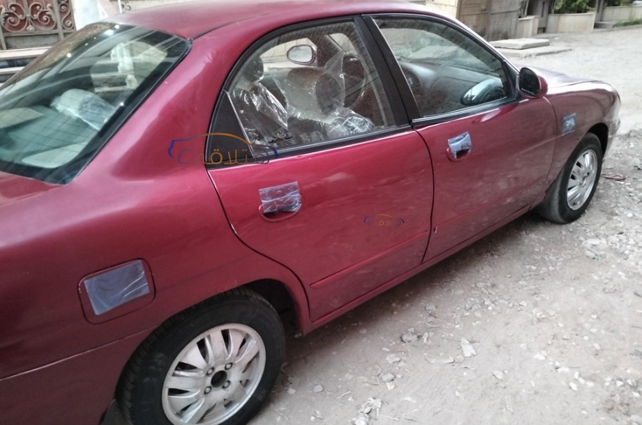 Nubira 2 Daewoo Dark red