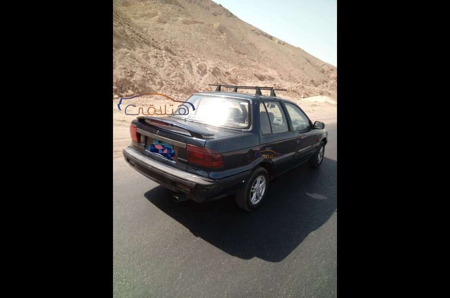 Lancer Mitsubishi أزرق