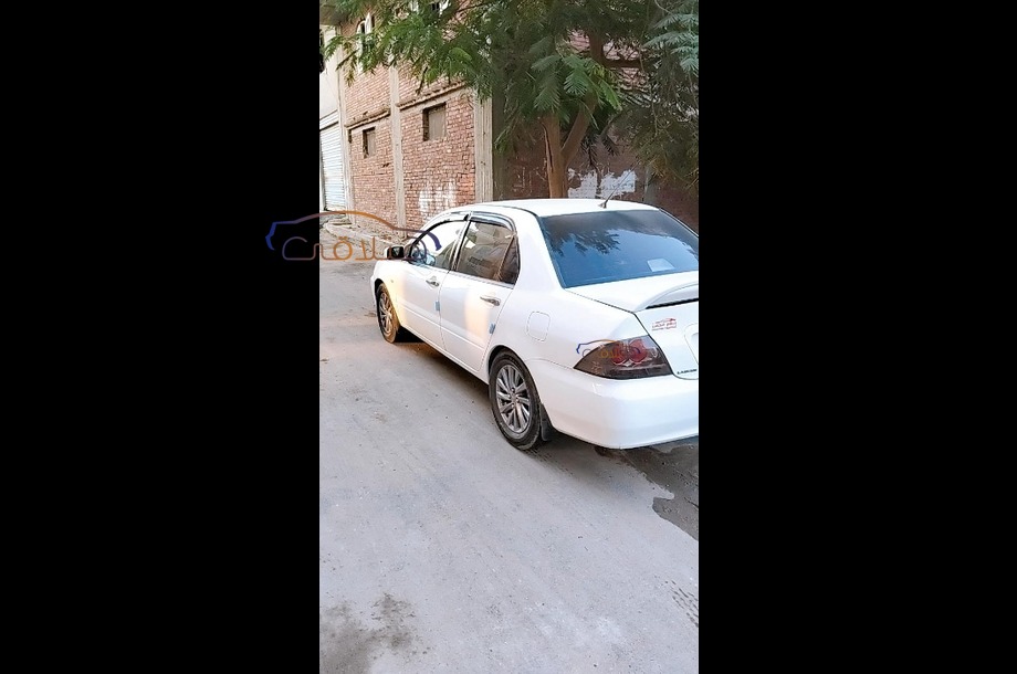 Lancer Puma Mitsubishi White