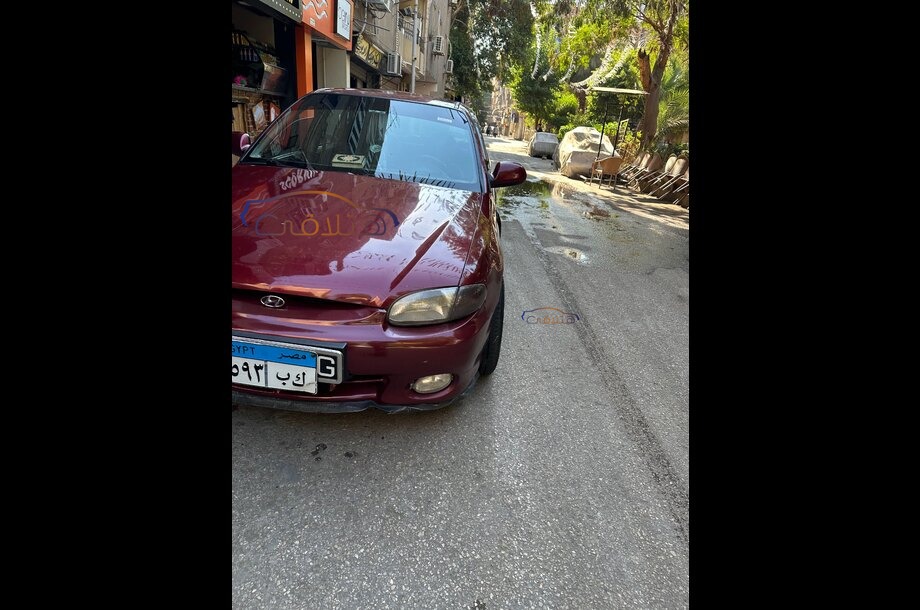 Accent Hyundai Dark red