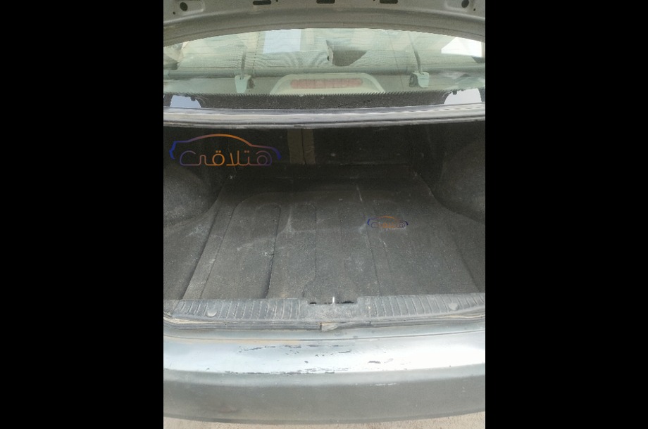 Optra Chevrolet رمادي