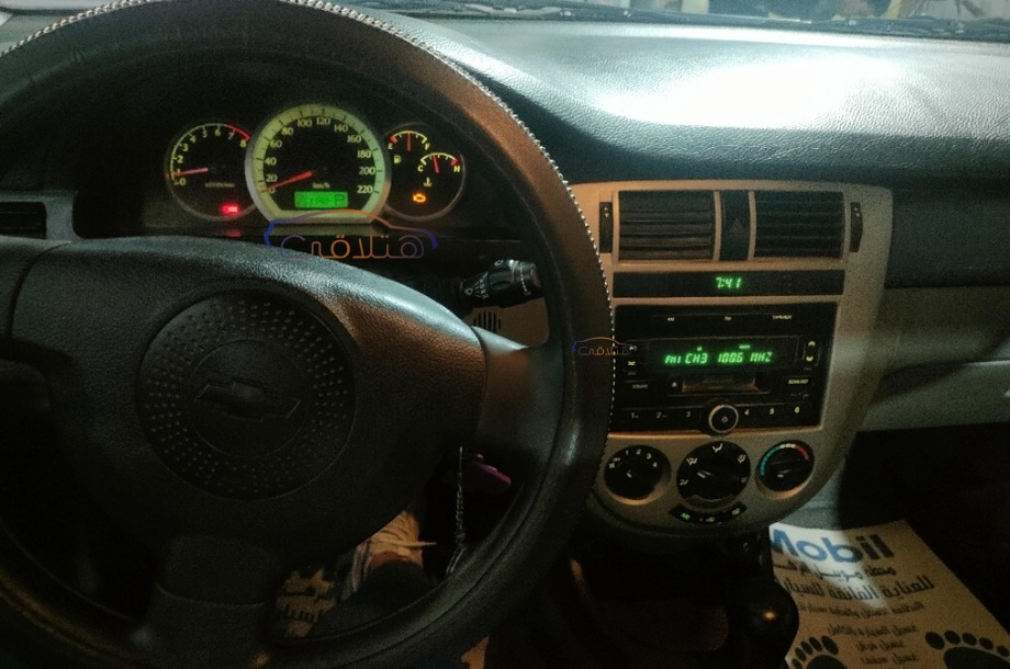 Optra Chevrolet رمادي