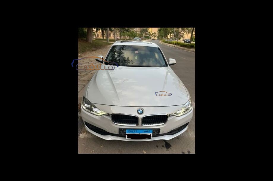 318 BMW أبيض
