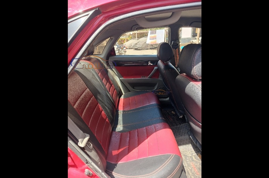 Optra Chevrolet احمر غامق