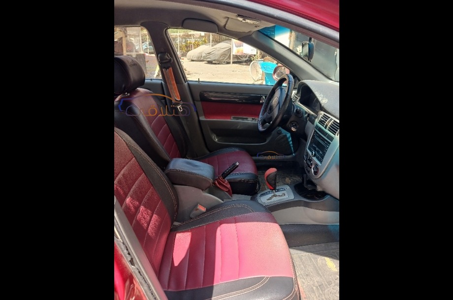 Optra Chevrolet احمر غامق