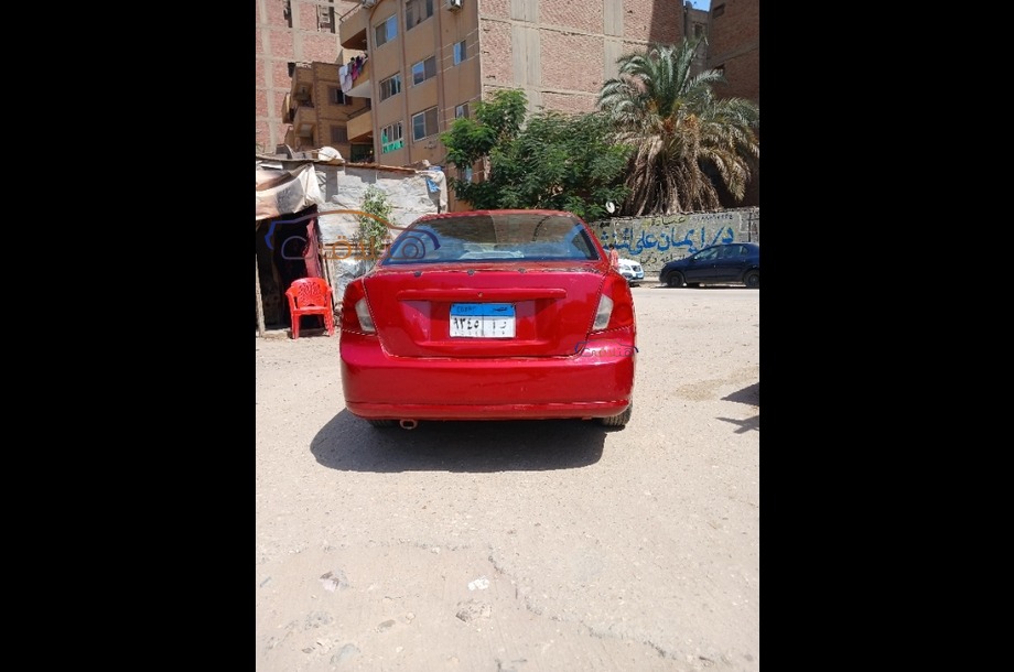 Optra Chevrolet احمر غامق