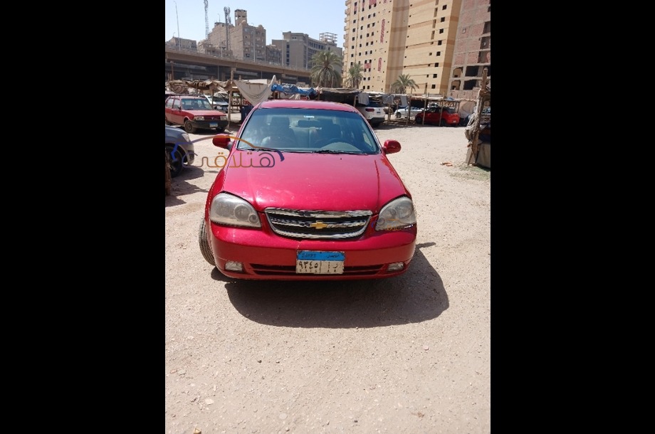Optra Chevrolet احمر غامق
