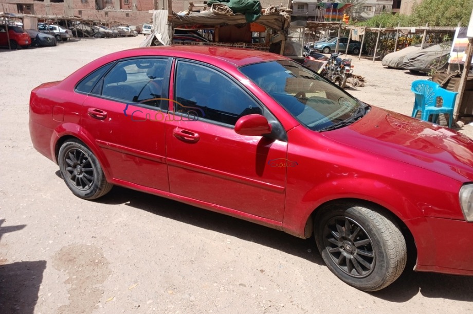 Optra Chevrolet احمر غامق