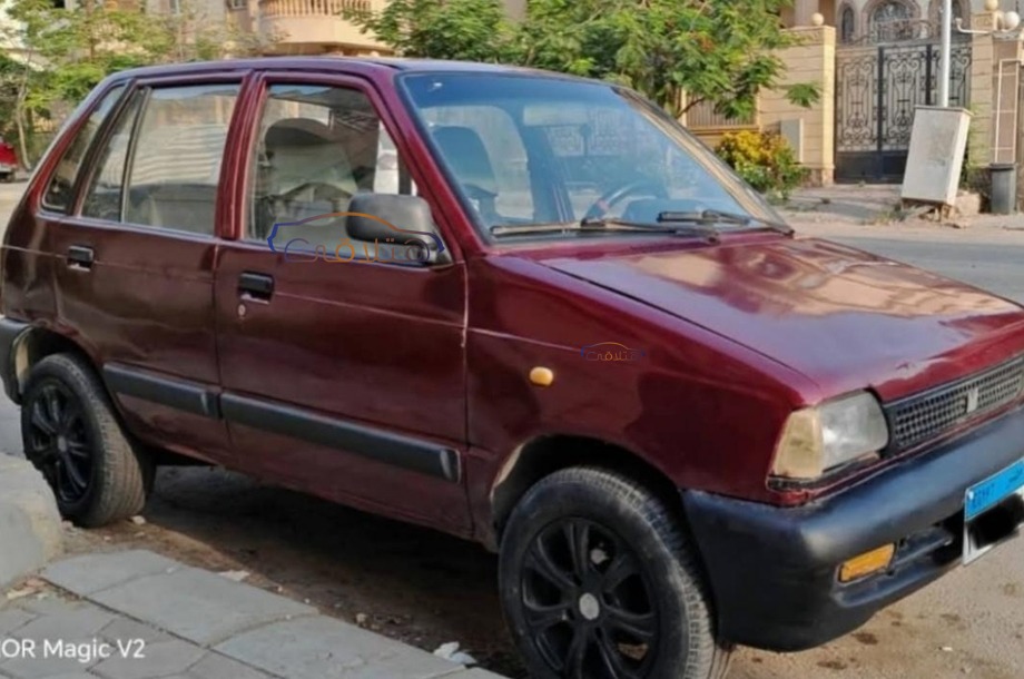 Maruti Suzuki احمر غامق