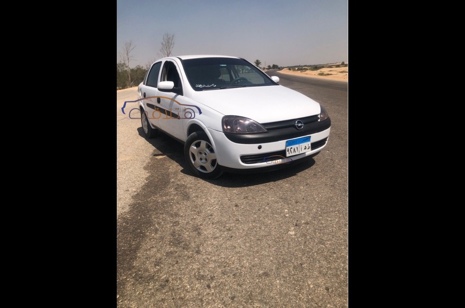 Corsa Opel أبيض