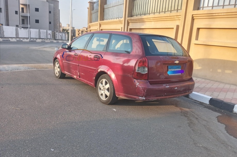 Optra Chevrolet احمر غامق