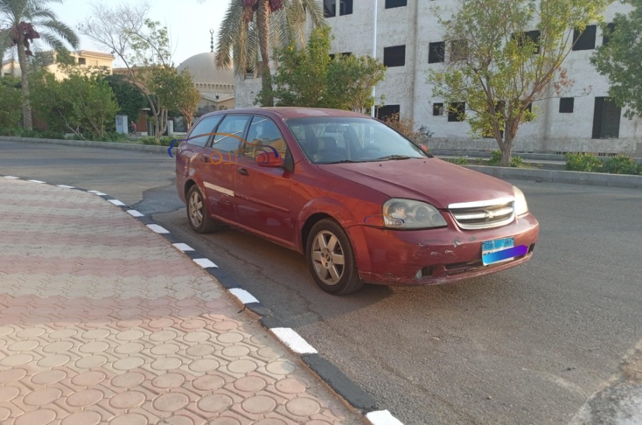 Optra Chevrolet احمر غامق