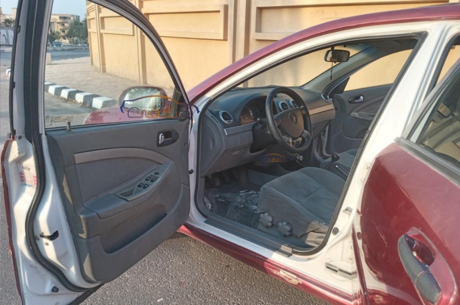 Optra Chevrolet احمر غامق