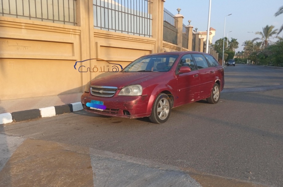 Optra Chevrolet احمر غامق