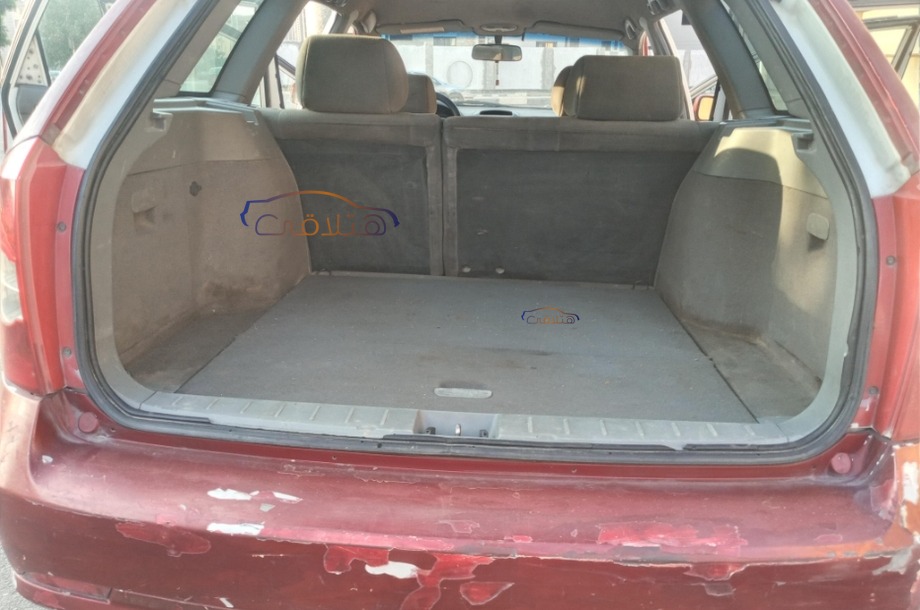 Optra Chevrolet احمر غامق