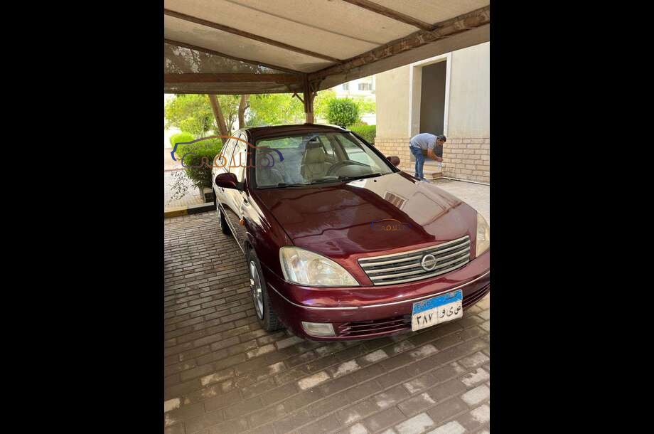 Sunny Nissan Dark red