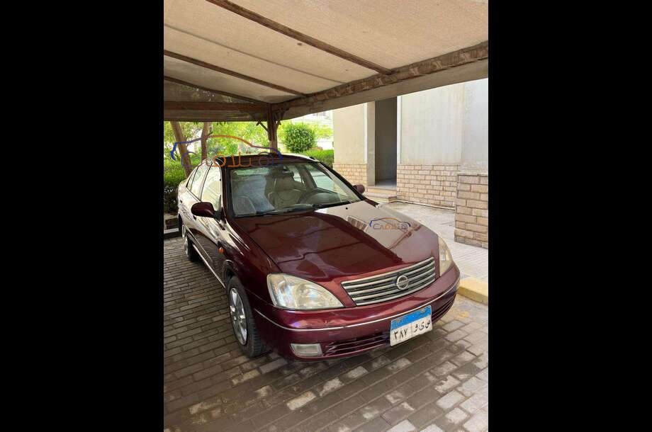 Sunny Nissan Dark red