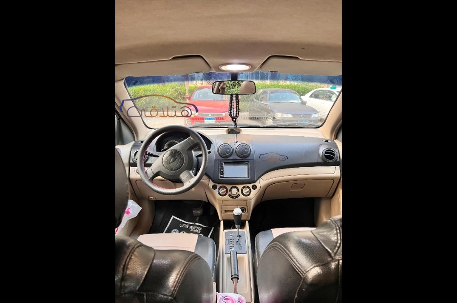 Aveo Chevrolet فضي