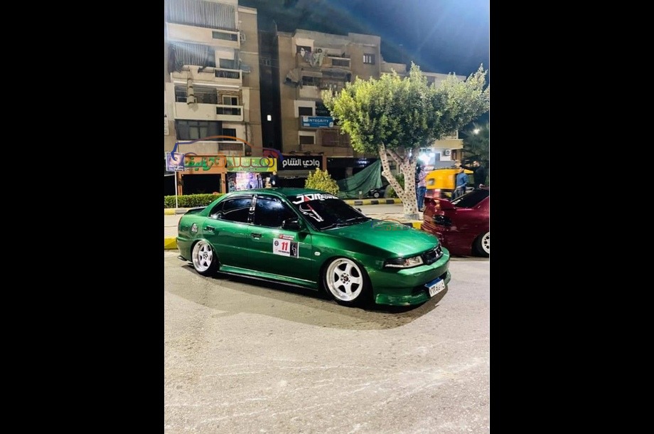 Lancer Crystala Mitsubishi Dark green